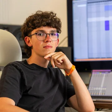 LÜZ in a music studio.