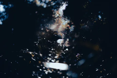 Abstract motion artwork representing Subsideath.